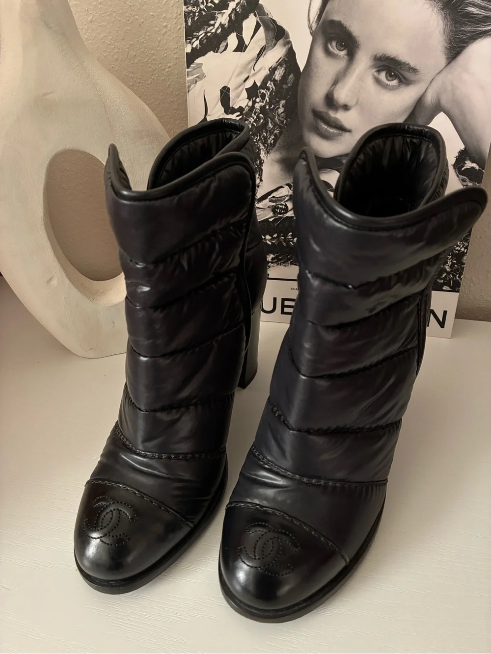 CHANEL Black Quilted Puff Leather Ankle Boots with Logo Cap Toe